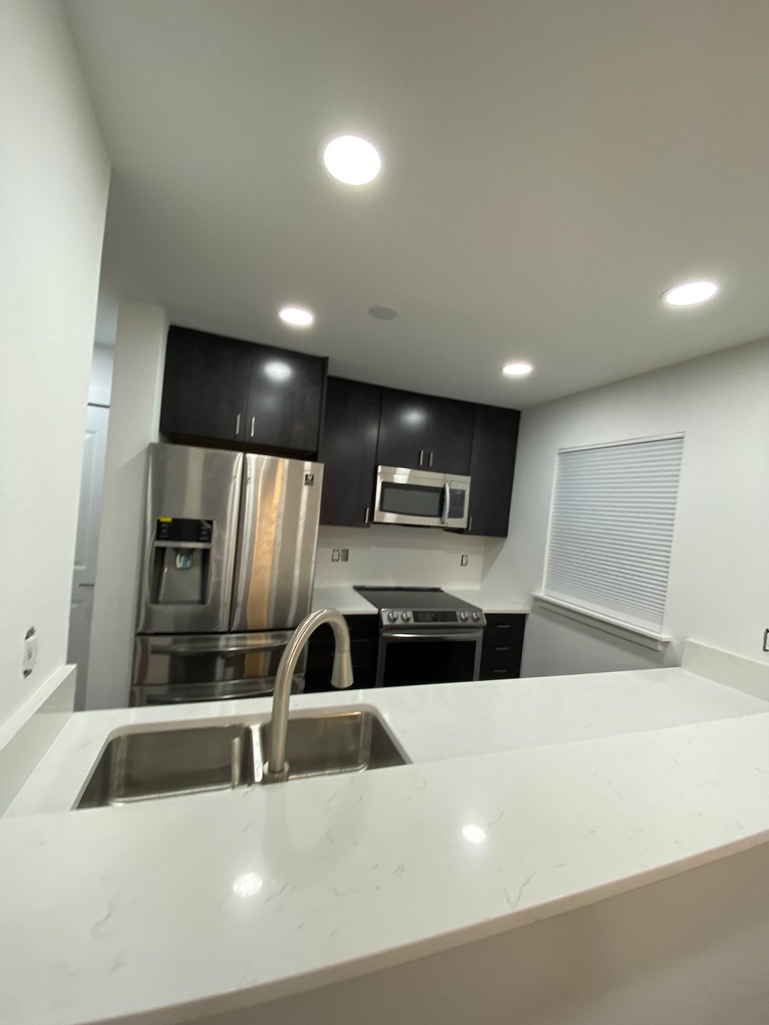 Bellevue Condo Shines with a High-End Kitchen Remodel by KG Construction!
